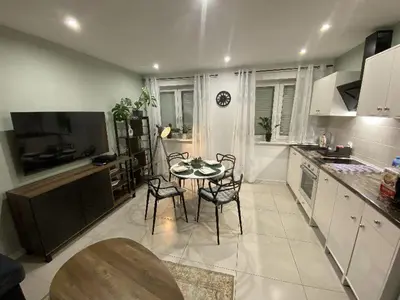 Kuchnia lub aneks kuchenny w obiekcie Apartament Błogi Sen III - komfortowy nocleg w spokojnej lokalizacji