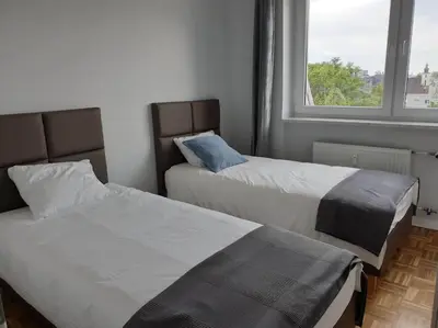 Łóżko lub łóżka w pokoju w obiekcie Duplex 250 m from Market Square