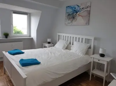 Łóżko lub łóżka w pokoju w obiekcie Duplex 250 m from Market Square