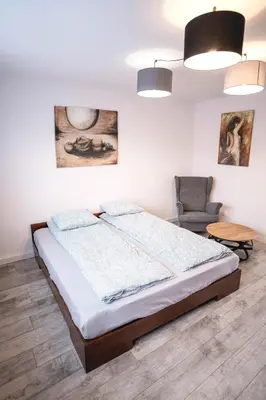 Łóżko lub łóżka w pokoju w obiekcie Z widokiem na Zamek