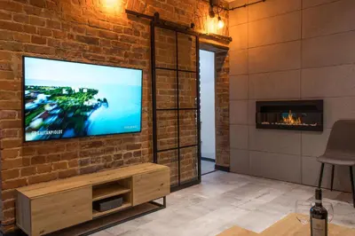Telewizja i/lub zestaw kina domowego w obiekcie Apartament Black Loft