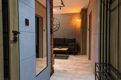 Część wypoczynkowa w obiekcie Apartament Black Loft