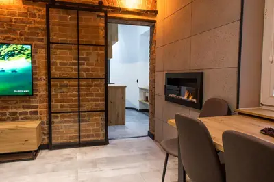 Telewizja i/lub zestaw kina domowego w obiekcie Apartament Black Loft