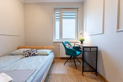 Łóżko lub łóżka w pokoju w obiekcie 53m2 Apartament Premium z Widokiem na Góry, Balkon, Zachód Słońca, Parking - Kłodzko - Przyjaciół Ziemi Kłodzkiej, Centrum Kotlina Kłodzka