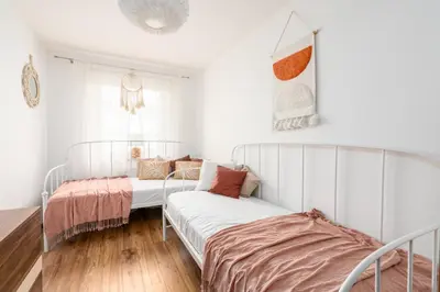 Łóżko lub łóżka w pokoju w obiekcie A.S. Home Tęczowa street 3 rooms Apartment
