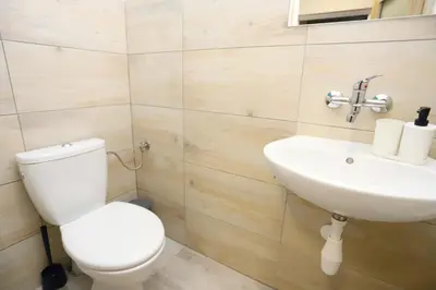 Łazienka w obiekcie Noclegi Pan Tadeusz