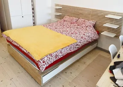 Łóżko lub łóżka w pokoju w obiekcie Wrocławski Manhattan