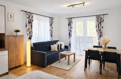 Część wypoczynkowa w obiekcie Willa Sowia nowy apartament z prywatnym tarasem i widokiem na góry