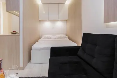 Łóżko lub łóżka w pokoju w obiekcie MIA Centrum Wrocław