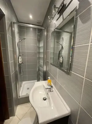 Łazienka w obiekcie Pokoje dominikańskie / Dominican rooms