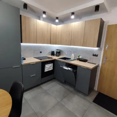 Kuchnia lub aneks kuchenny w obiekcie Mieszkanie w nowoczesnym Halo Apartament w centrum