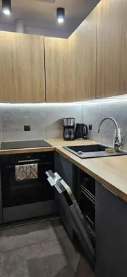 Kuchnia lub aneks kuchenny w obiekcie Mieszkanie w nowoczesnym Halo Apartament w centrum