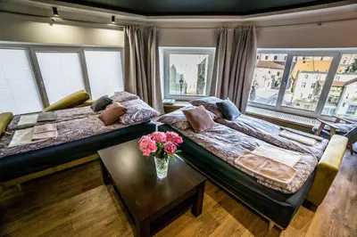 Łóżko lub łóżka w pokoju w obiekcie Uroczy apartament Wita Stwosza most Kłodzko