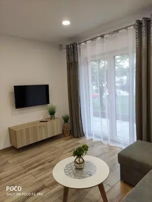 Telewizja i/lub zestaw kina domowego w obiekcie Apartamenty Pod Lipami