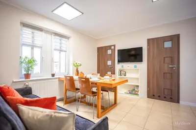 Telewizja i/lub zestaw kina domowego w obiekcie Apartament na deptaku z klimatyzacją, MyWeek