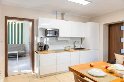 Kuchnia lub aneks kuchenny w obiekcie Apartament na deptaku z klimatyzacją, MyWeek