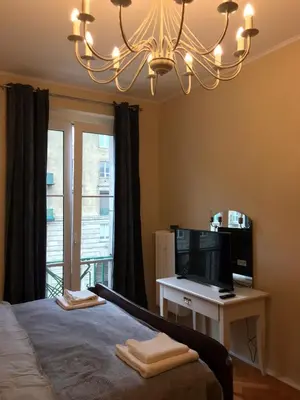Telewizja i/lub zestaw kina domowego w obiekcie Stylowy apartament w centrum