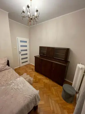 Łóżko lub łóżka w pokoju w obiekcie Stylowy apartament w centrum