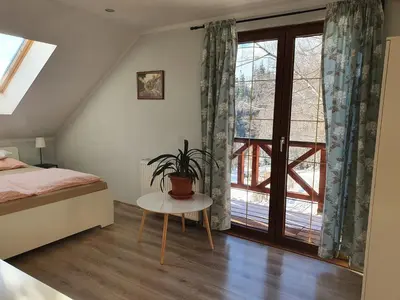 Łóżko lub łóżka w pokoju w obiekcie Księżycowa Dolina