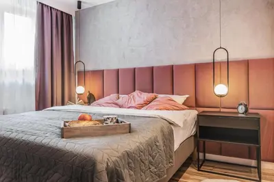 Łóżko lub łóżka w pokoju w obiekcie Stylowa oaza w sercu miasta
