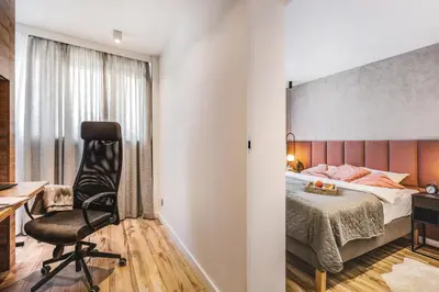 Łóżko lub łóżka w pokoju w obiekcie Stylowa oaza w sercu miasta