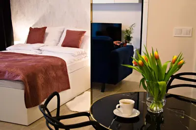 Łóżko lub łóżka w pokoju w obiekcie Cherub Apartment