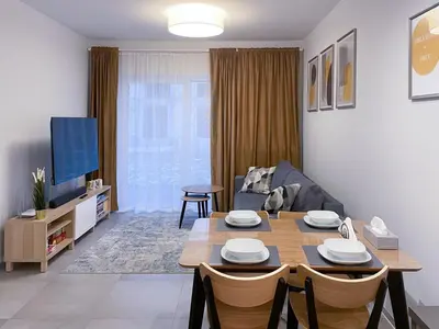 Telewizja i/lub zestaw kina domowego w obiekcie Apartament Cudovny z własnym ogródkiem i miejscem parkingowym w garażu
