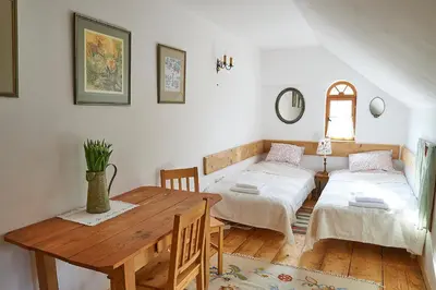 Łóżko lub łóżka w pokoju w obiekcie Dom Geologa