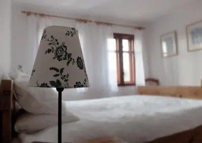 Łóżko lub łóżka w pokoju w obiekcie Dom Geologa