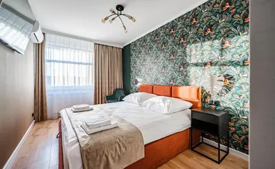 Łóżko lub łóżka w pokoju w obiekcie APARTMENT 24H WITH FREE GARAGE AND AC Jagiełły 5