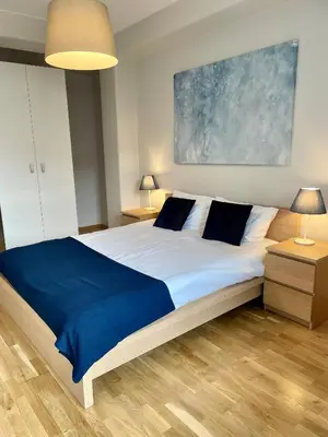 Łóżko lub łóżka w pokoju w obiekcie Boutique Apartments - Old Town 120m2 - Private Underground Parking -