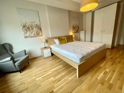 Łóżko lub łóżka w pokoju w obiekcie Boutique Apartments - Old Town 120m2 - Private Underground Parking -