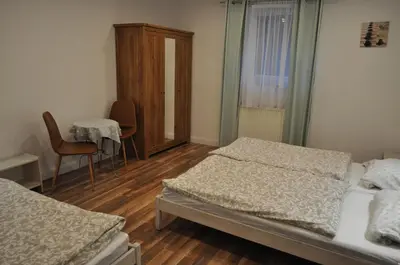 Łóżko lub łóżka w pokoju w obiekcie Apartament u Zięby