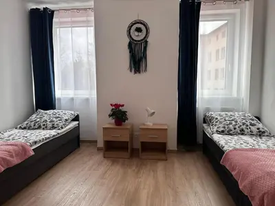 Łóżko lub łóżka w pokoju w obiekcie Agroturystyka Pod Świerkami