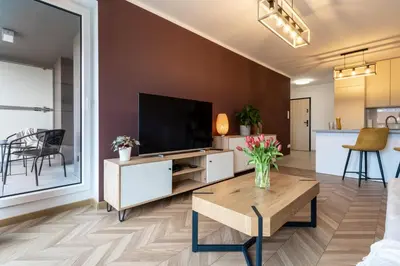 Telewizja i/lub zestaw kina domowego w obiekcie LOTTE Apartment - parking podziemny, osiedle strzeżone