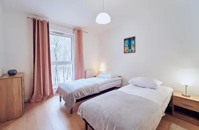 Łóżko lub łóżka w pokoju w obiekcie Marel-Apartment Willa Fonte - apartament 8