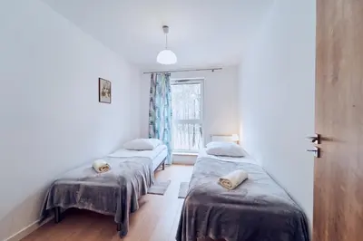 Łóżko lub łóżka w pokoju w obiekcie Marel-Apartment Willa Fonte - apartament 8