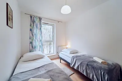 Łóżko lub łóżka w pokoju w obiekcie Marel-Apartment Willa Fonte - apartament 8