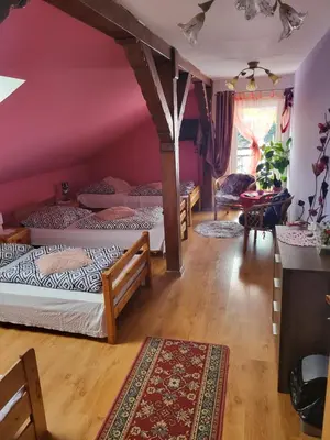 Łóżko lub łóżka w pokoju w obiekcie Agroturystyka Świerki