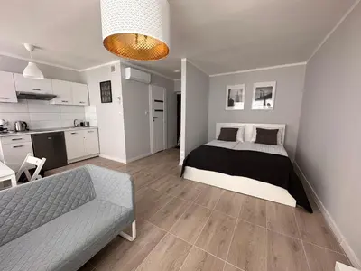 Kuchnia lub aneks kuchenny w obiekcie APARTAMENT OŚ. ZŁOTE 5F