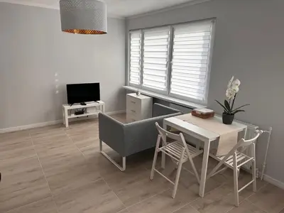 Telewizja i/lub zestaw kina domowego w obiekcie APARTAMENT OŚ. ZŁOTE 5F