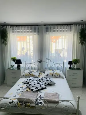 Łóżko lub łóżka w pokoju w obiekcie Apartament u Danusi