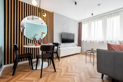 Telewizja i/lub zestaw kina domowego w obiekcie Kairos Apartments - Szafir - darmowy Parking, ścisłe centrum