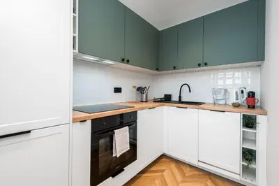 Kuchnia lub aneks kuchenny w obiekcie Kairos Apartments - Szafir - darmowy Parking, ścisłe centrum