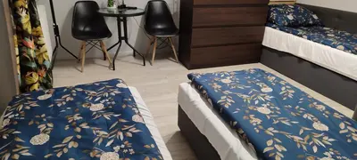 Łóżko lub łóżka w pokoju w obiekcie Przytulny Zakątek