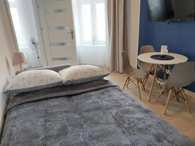 Łóżko lub łóżka w pokoju w obiekcie Apartamenty - Studio Gliwice II