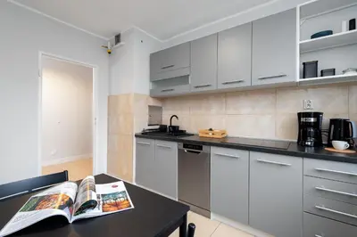 Kuchnia lub aneks kuchenny w obiekcie Kairos Apartments - Friends - darmowy Parking, blisko centrum