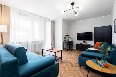 Telewizja i/lub zestaw kina domowego w obiekcie Kairos Apartments - Friends - darmowy Parking, blisko centrum