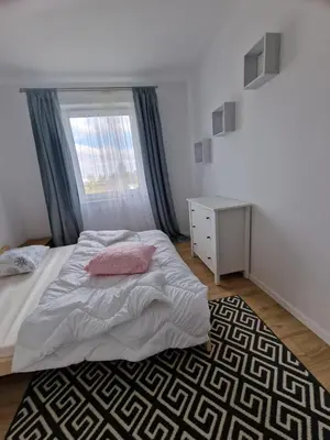 Łóżko lub łóżka w pokoju w obiekcie Oława Chabrów