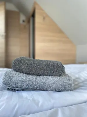 Łóżko lub łóżka w pokoju w obiekcie Pokoje do wynajęcia Massek